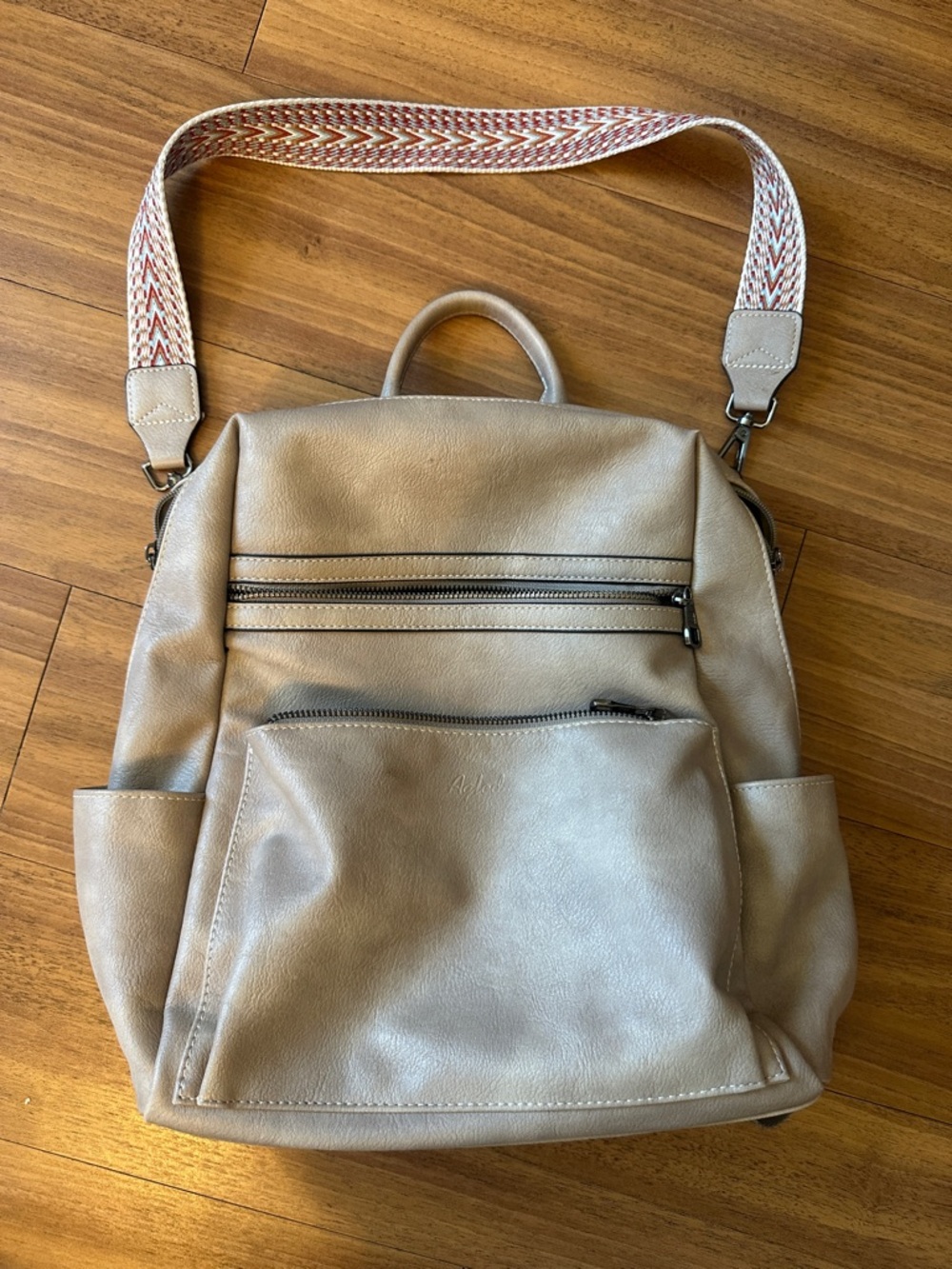 Neutral Taupe Faux Leather Backpack with Patterned Strap